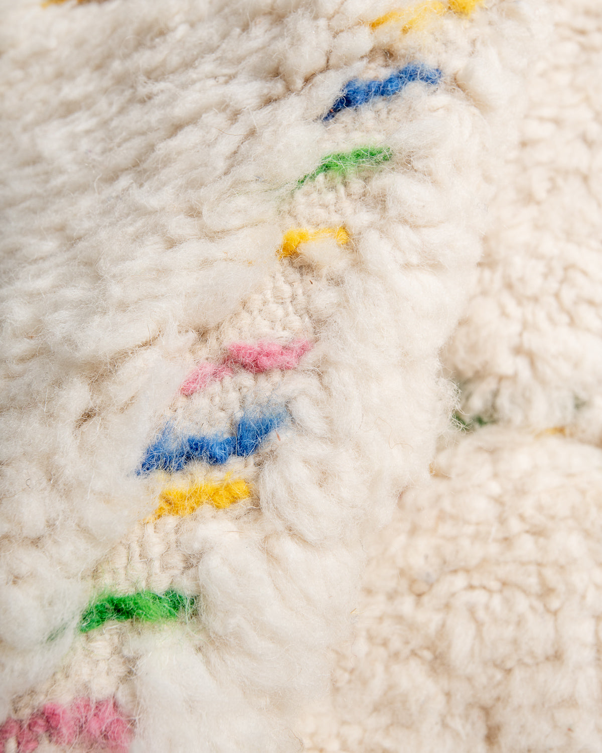 Modern, designer, handcrafted Berber rug from Morocco. Beniourain carpet with beautiful colours and patterns and fluffy wool texture.